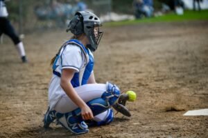 A Catcher Catching a Baseball